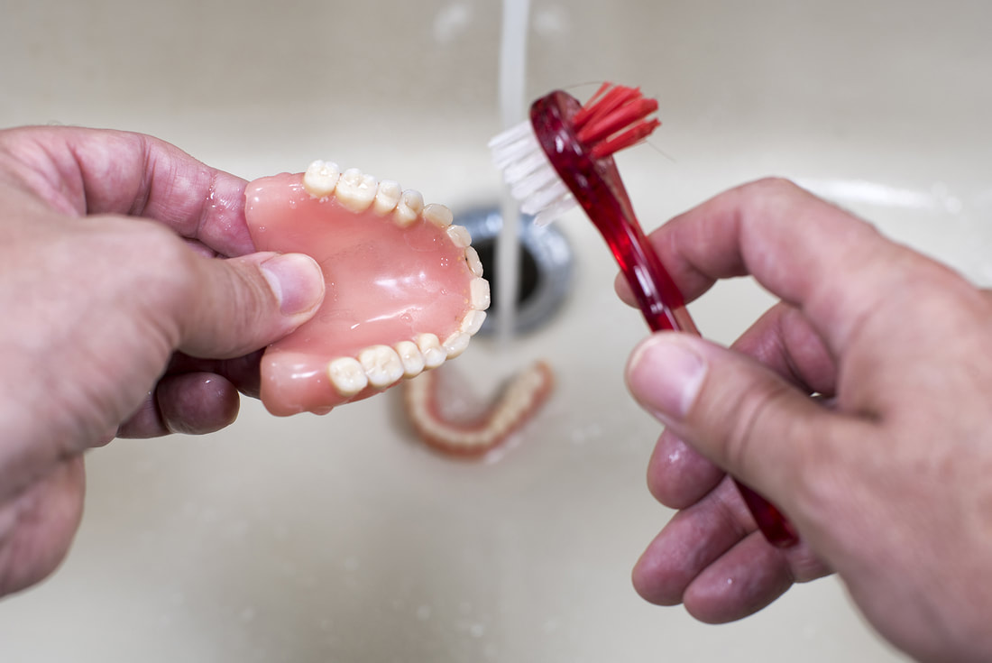 Cleaning, Edward's Denture Clinic